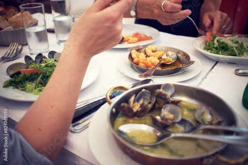 Wallpaper Mural Cropped image of people having food at table in restaurant Torontodigital.ca