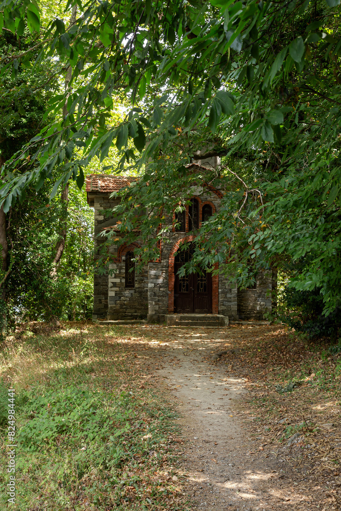 Small, stone church in the forest (Greece; Pelion) Small, stone church in the forest (Greece; Pelion)
