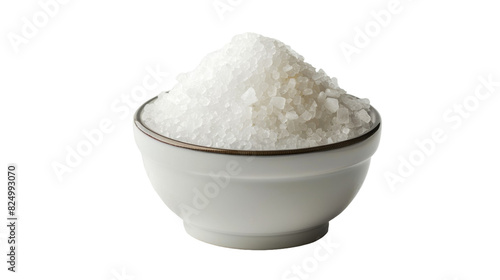 A white bowl containing sugar sits atop a white table