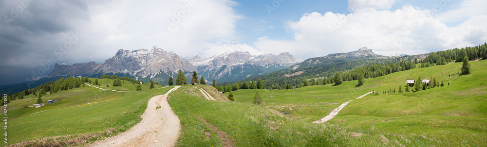 hiking trail on the plateau landscape, view over  Pralongia meadows,  Dolomites alps