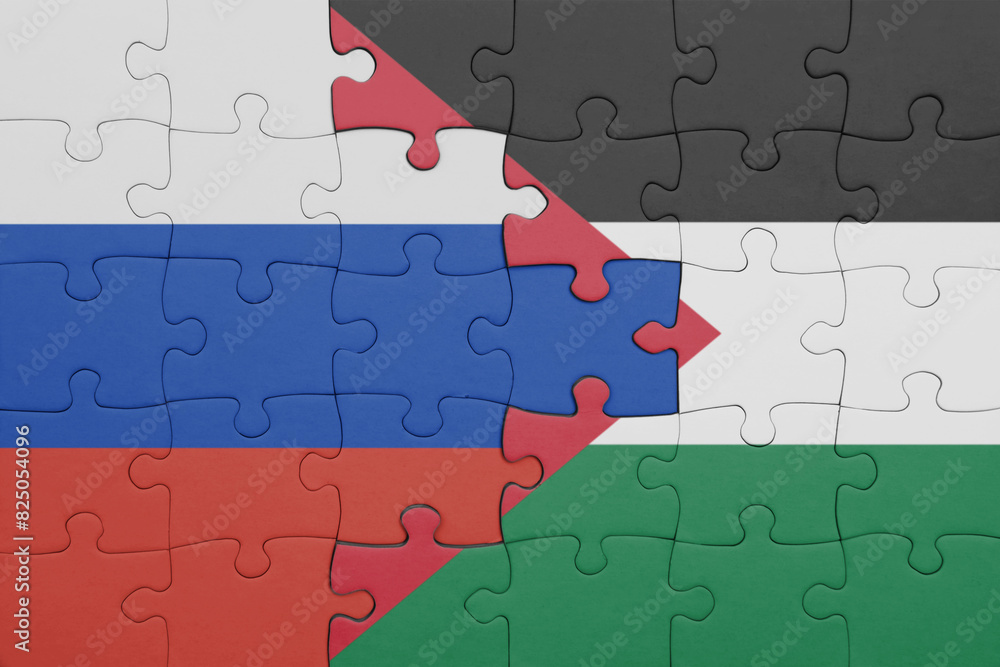 puzzle with the colourful national flag of palestine and flag of russia. puzzle with the colourful national flag of palestine and flag of russia.