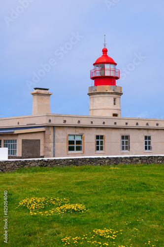 Beautiful view over Lighthouse or beacon Farol de Albarnaz on the Atlantic ocean coast on the Flores island, the Azores, Portugal.