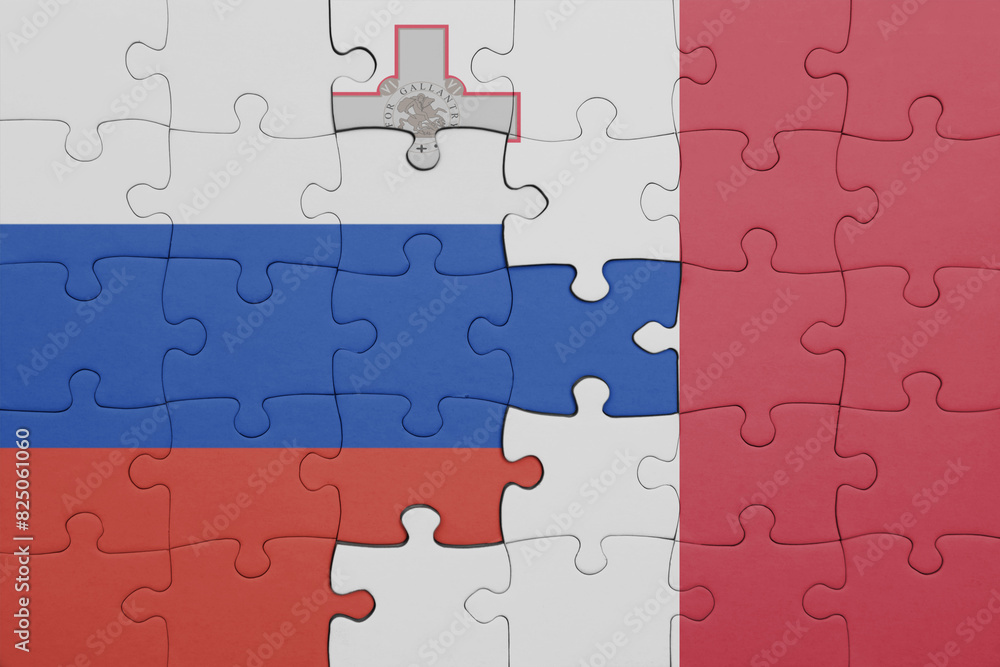 puzzle with the colourful national flag of malta and flag of russia. puzzle with the colourful national flag of malta and flag of russia.