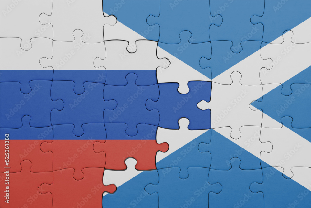 puzzle with the colourful national flag of scotland and flag of russia. puzzle with the colourful national flag of scotland and flag of russia.