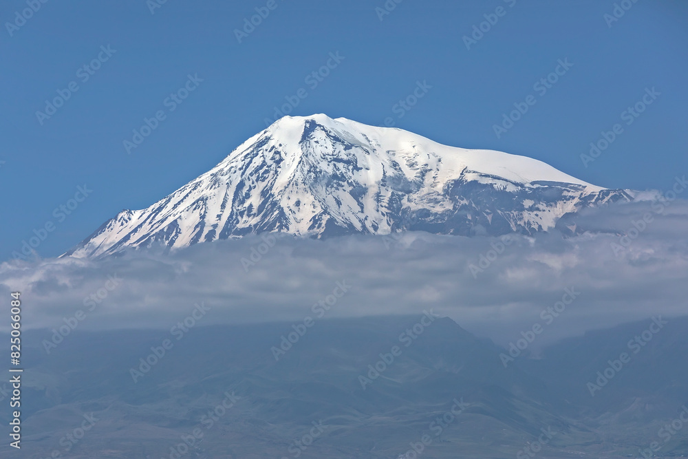 Mount Ararat covered with snow, dormant compound volcano in the extreme east of Turkey. View from the Armenian side. Mount Ararat covered with snow, dormant compound volcano in the extreme east of Turkey. View from the Armenian side.