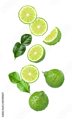 Bergamot with green leaf and cut half slice flying in the air isolated on white background.