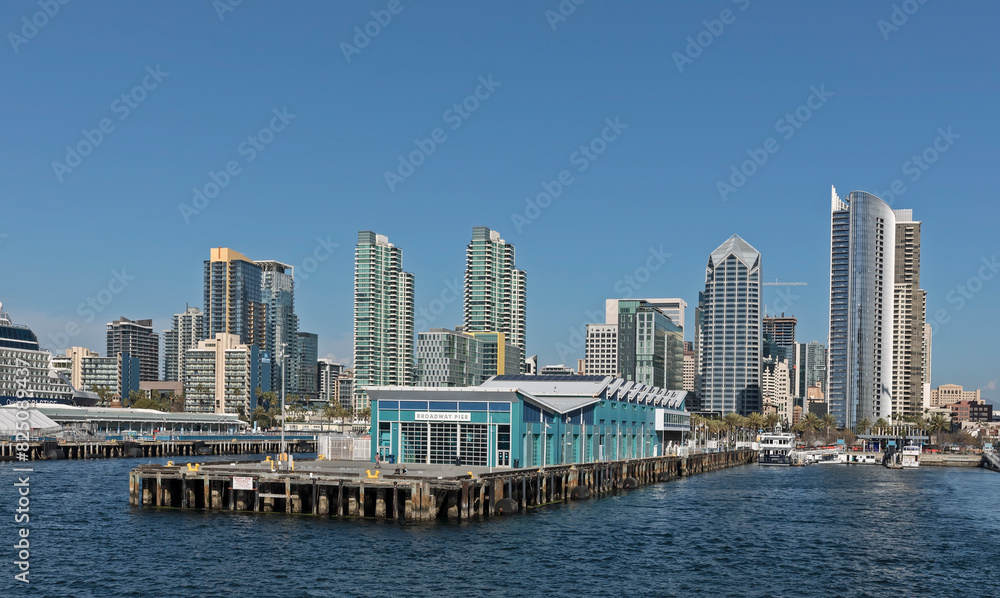San Diego, California - March 17, 2023: Broadway Pier in Downtown San Diego. View from San Diego Bay. San Diego, California - March 17, 2023: Broadway Pier in Downtown San Diego. View from San Diego Bay.