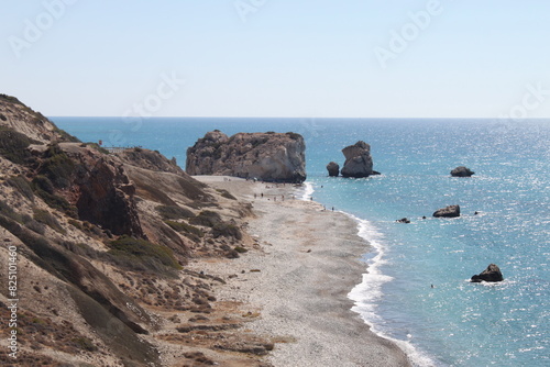 View of the shore at Petra tou Romiou and Aphrodite´s Rock in Paphos, Cyprus at Mediterranean Sea. Popular tourist location. According to mythology it is the birthplace of Aphrodite. Sunny day.