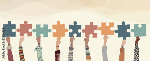 Problem solving concept. Raised hand of multicultural business women and business men holding a jigsaw puzzle piece. Metaphor. Strategy concept.Joining puzzle pieces.Match.Banner space