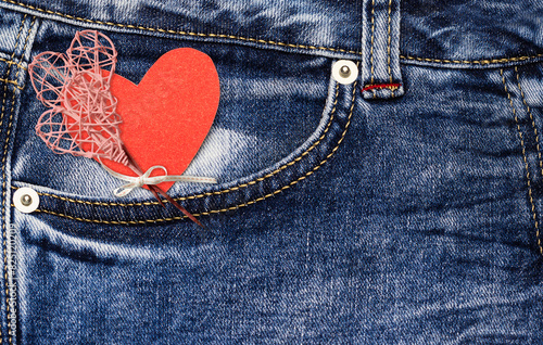 There's a heart in a jeans pocket. Valentine's card. photo