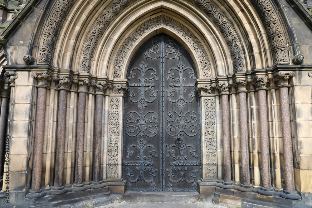 Naklejka premium Beautiful medieval wooden door of a church in Scotland, UK