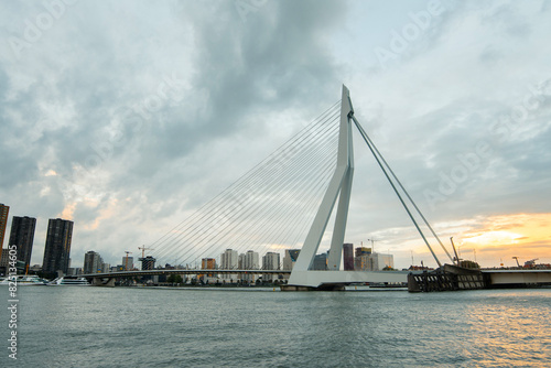 Rotterdam City  Erasmus Bridge  Erasmusbrug. View across the Nieuwe Maas  New Meuse River at sunset. The Netherlands. Rotterdam Skyline