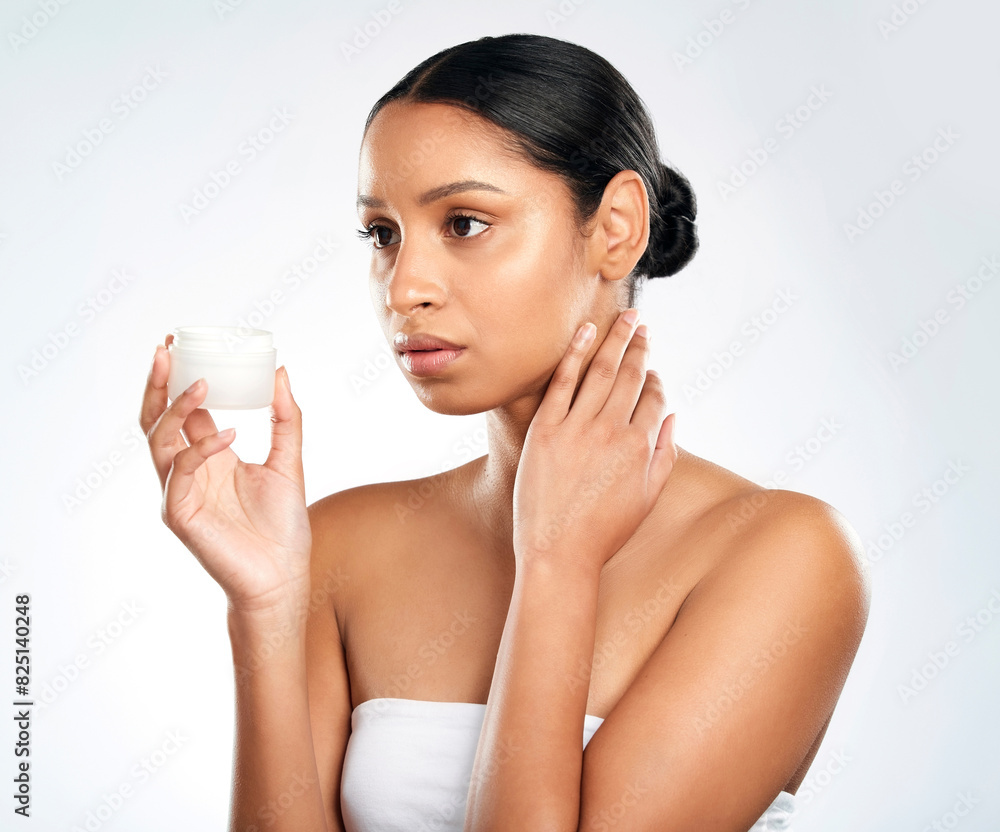 Thinking, container and woman with cream, skincare and dermatology on white studio background. Person, model and girl with creme for dry skin, shine and glowing with cosmetics, beauty and wellness Thinking, container and woman with cream, skincare and dermatology on white studio background. Person, model and girl with creme for dry skin, shine and glowing with cosmetics, beauty and wellness