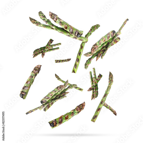 Grilled asparagus spears in air on white background