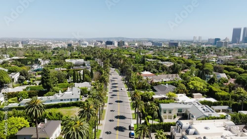 Beverly Hills Aerial 2024 - Pulling back and rising to reveal greater city and neighborhood