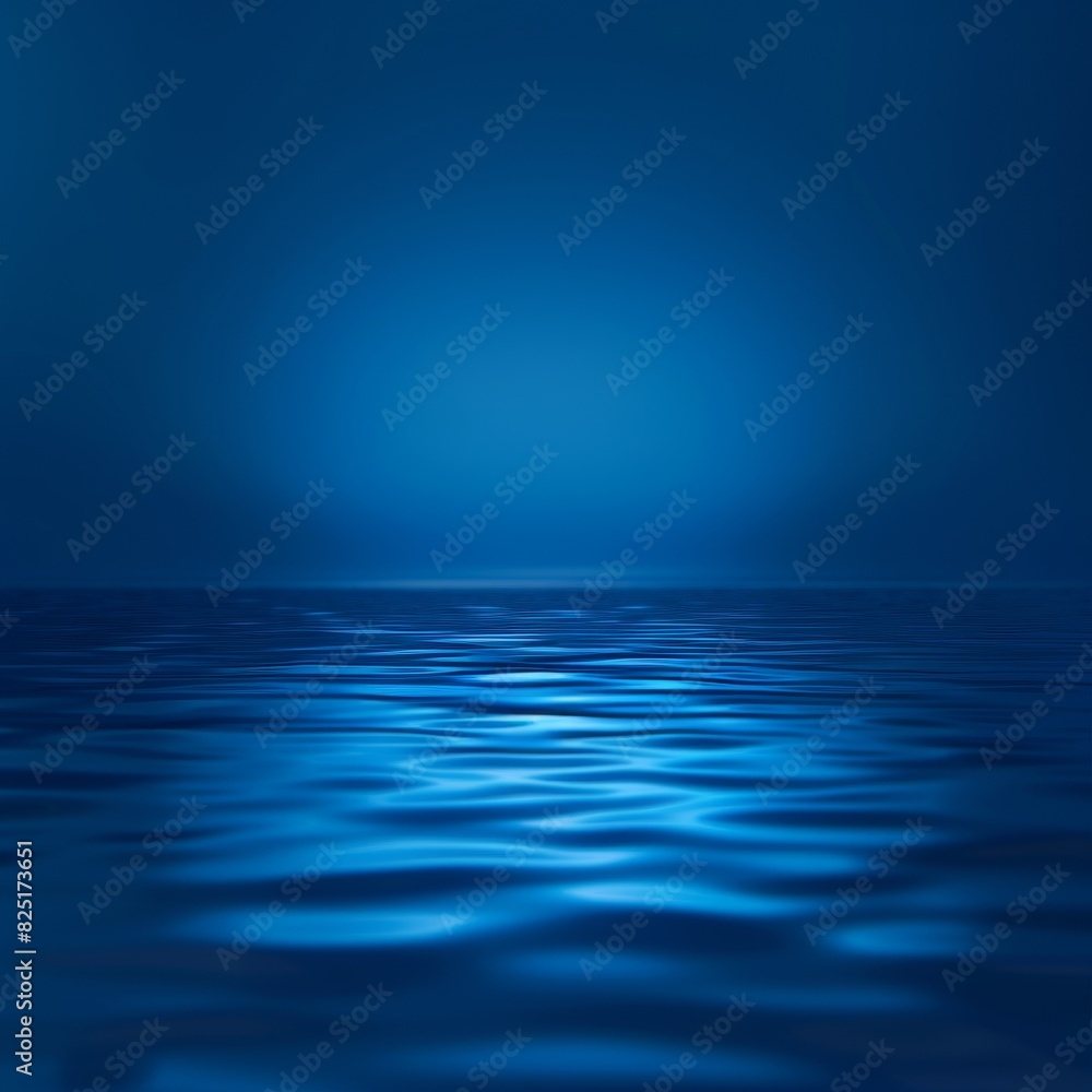 Obraz premium Calm ocean surface with gentle waves, serene blue sky and water, minimalist seascape.