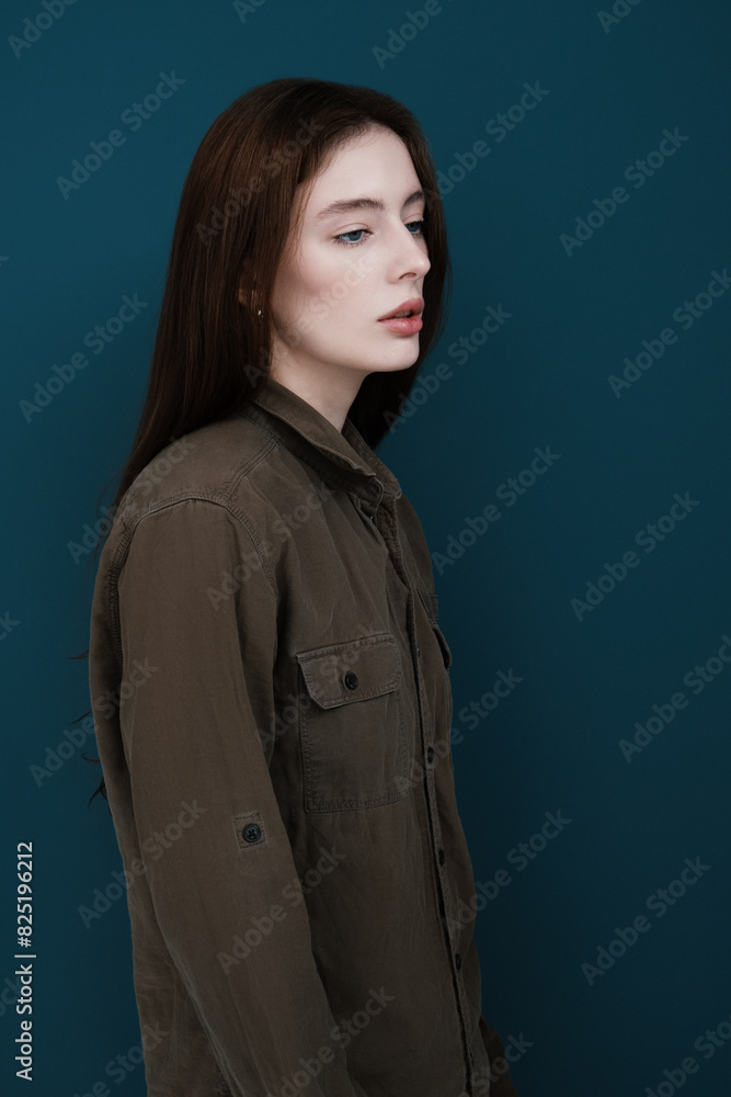 Woman in shirt on blue background Woman in shirt on blue background