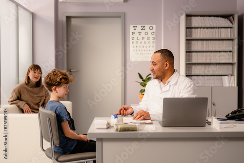 Medical appointment in the pediatrician's office photo