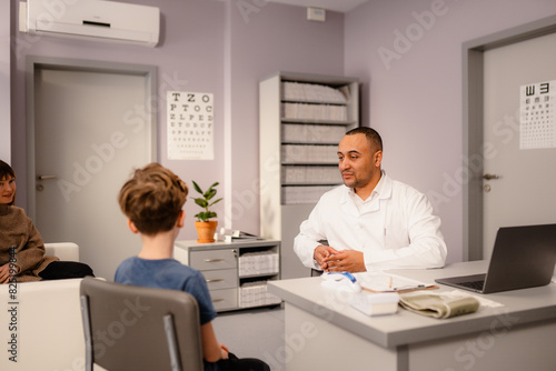 Medical appointment in the pediatrician's office photo