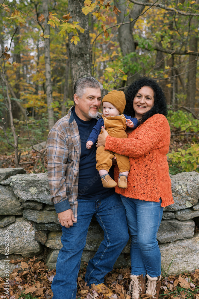 grandparents with their grandson outdoors in autumn grandparents with their grandson outdoors in autumn