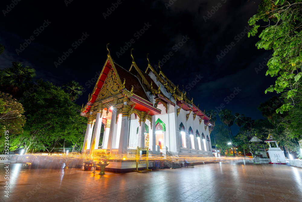 Naklejka premium Candlelight around Pagoda Wat Mat chi ma wat temple Udon Thani, Thailand.
