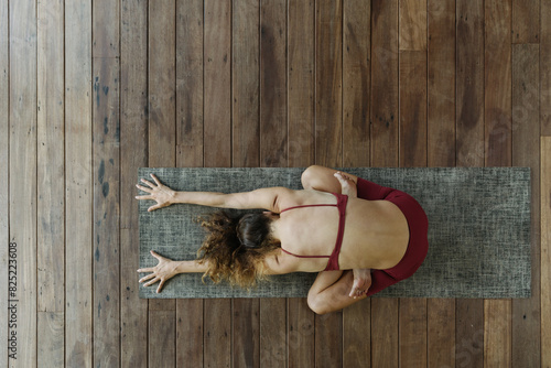 Top view of a woman doing yoga  photo