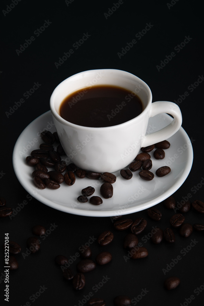 Little white Cup of black expresso coffee