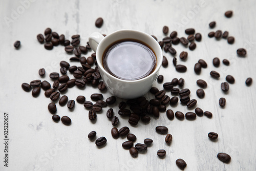 Little white Cup of black expresso coffee