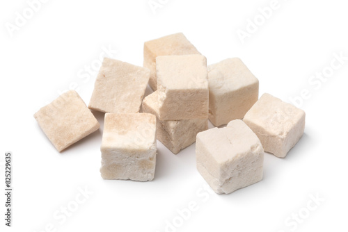 Dried cubes of Wolfiporia extensa close up isolated on white background photo