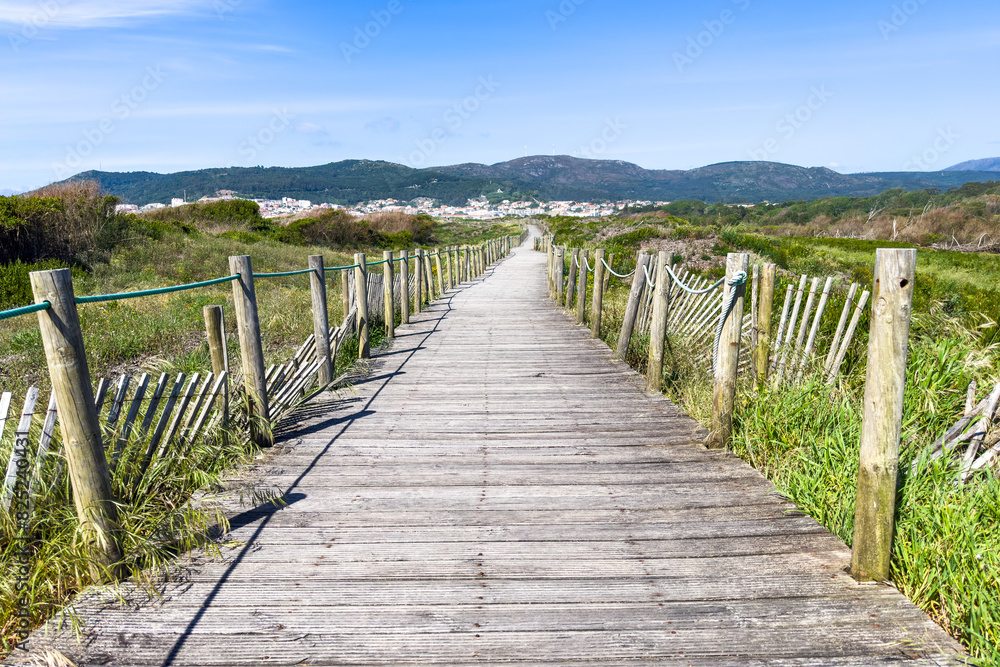 Fototapeta premium Coastal Boardwalk to Vila Praia de Ancora
