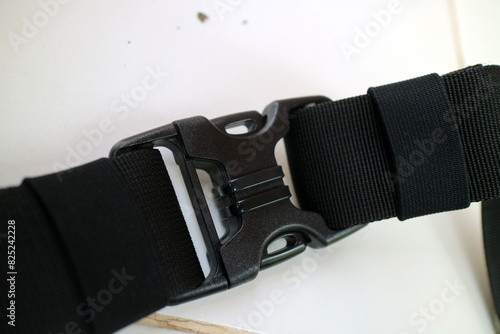 a large black strap lock bag