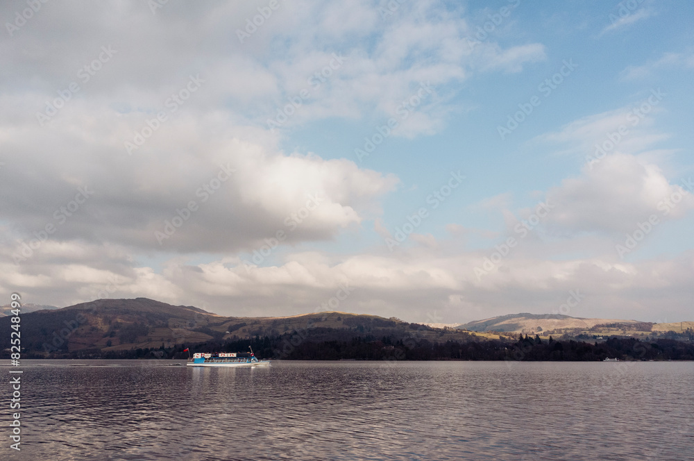 Tour cruise boat on Lake Windermere in winter Tour cruise boat on Lake Windermere in winter