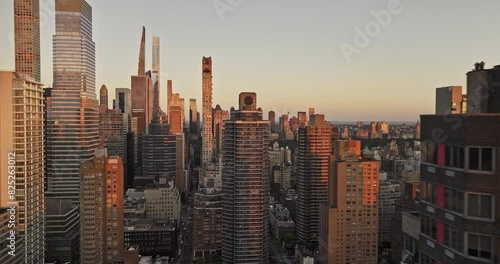 NYC New York Aerial v366 drone fly above 60th St capturing cityscape of Midtown Manhattan and Lenox Hill overlooking at Central Park at sunrise - Shot with Mavic 3 Pro Cine - September 2023