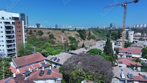 Aerial video of Gomer area in the city of Tel Aviv with skyscrapers in the background, Israel photo