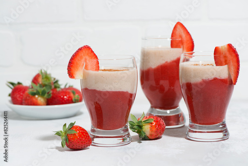 sweet strawberry yoghurt milkshake in glasses