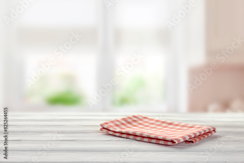 Tabletop empty copy space, food advertisement display.Folded cloth on wooden table. Border, layout.