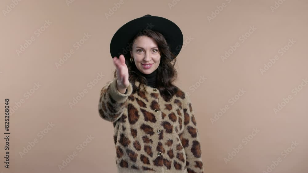 Mid aged woman asks join, beckons with inviting hand gesture. Hey you, come on Mid aged woman asks join, beckons with inviting hand gesture. Hey you, come on