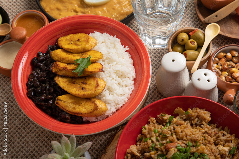Black beans and white rice with fried plantains banana cuban venezuelan food Black beans and white rice with fried plantains banana cuban venezuelan food