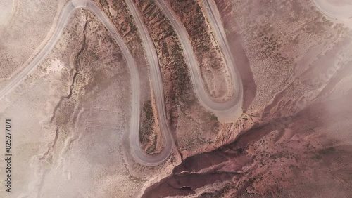 Aerial view of Lipán slope on national route 52, Drone shot passing through clouds. Jujuy. Road in arid area. Argentina. 4k drone. photo