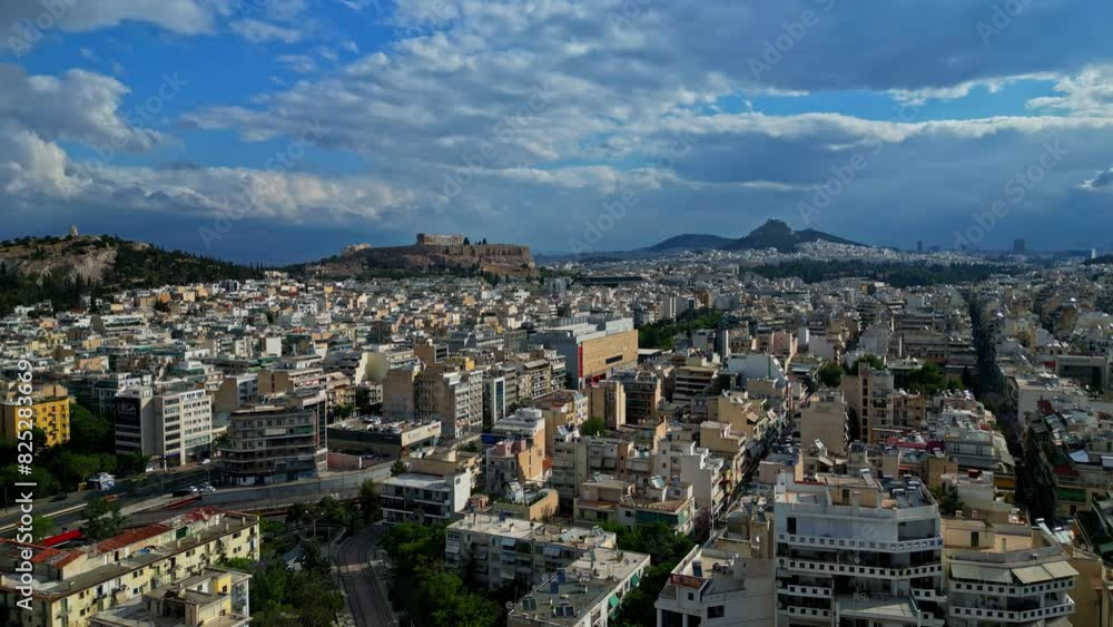 Aerial rising shot of the city of Athens and the Acropolis hill, in sunny Greece Aerial rising shot of the city of Athens and the Acropolis hill, in sunny Greece