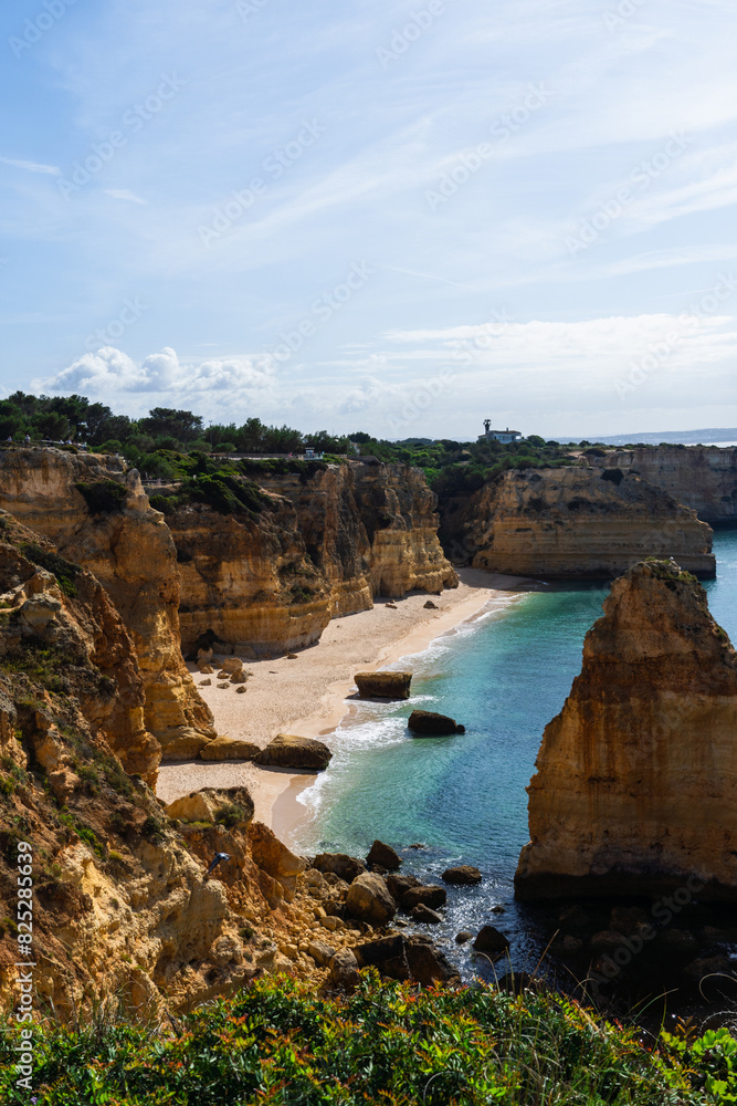 Marina Beach (Praia da Marinha) in Lagos, Algarve, Portugal. Algarve beaches are a touristic paradise. Sunny day. Marina Beach (Praia da Marinha) in Lagos, Algarve, Portugal. Algarve beaches are a touristic paradise. Sunny day.