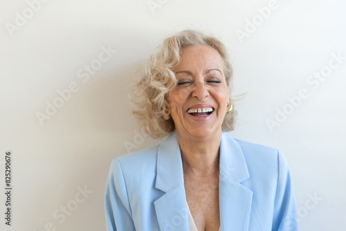 Joyful Senior Woman Laughing Heartily photo