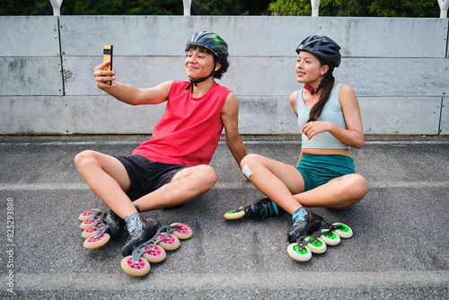 Couple of sportsmen taking a photo with the phone