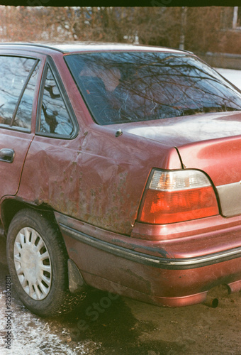 Worn Red Sedan