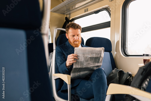 Businessman on train photo
