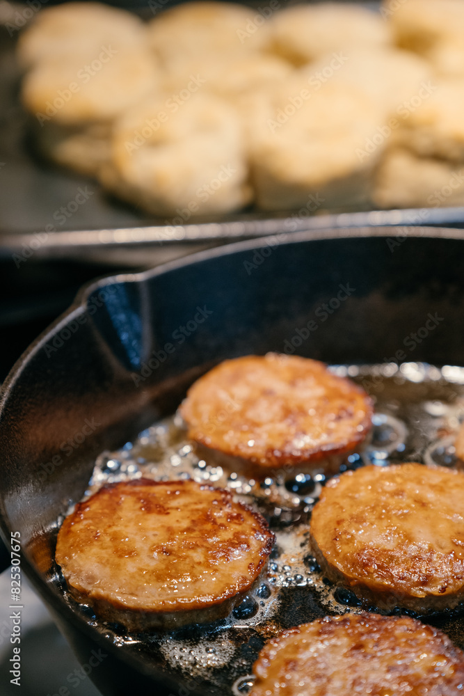 Vegan Sausage Patties Cooking in Cast Iron Skillet Vegan Sausage Patties Cooking in Cast Iron Skillet