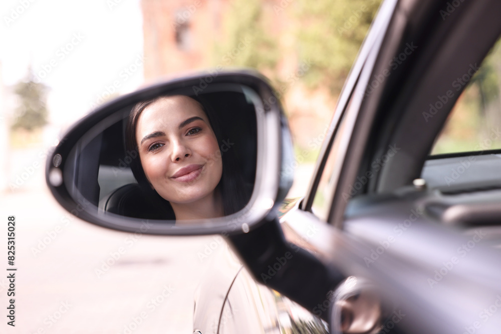 Woman with safety seat belt driving her modern car Woman with safety seat belt driving her modern car