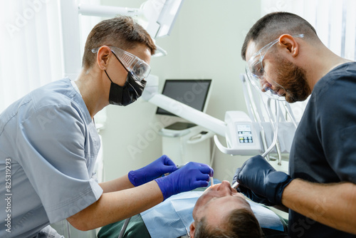 Dental treatment in the dental office photo