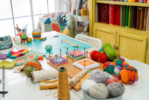Colorful craft room with knitting and sewing supplies photo