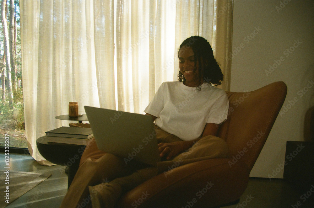 Woman Work with laptop in Serene Home Setting with Forest View Woman Work with laptop in Serene Home Setting with Forest View